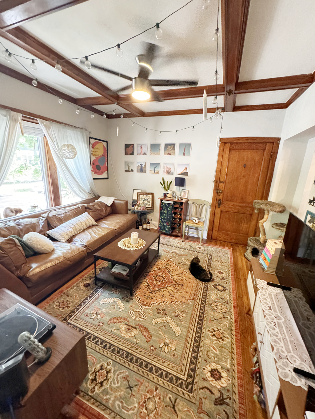 a living room with a couch and a table