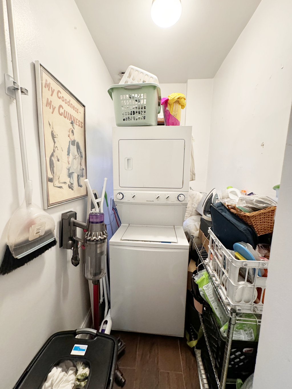 a small laundry room with a washer and dryer in it