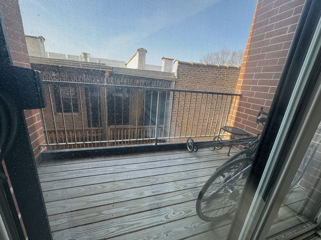 a balcony with a bike parked on it