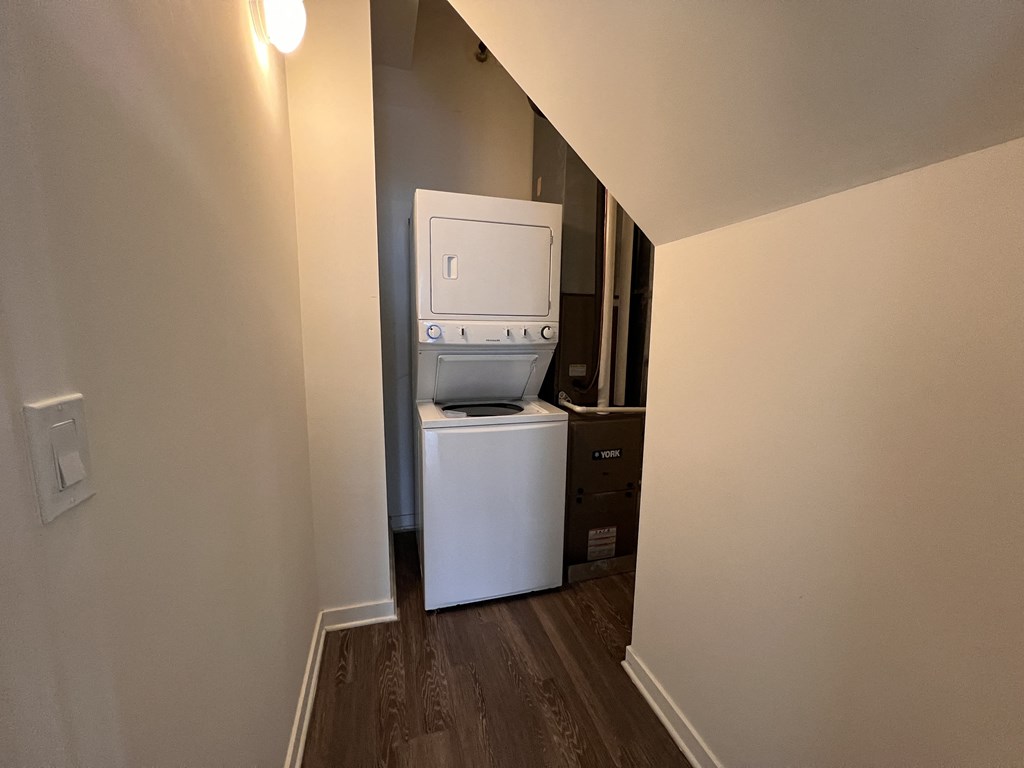 a small laundry room with a washer and dryer in it