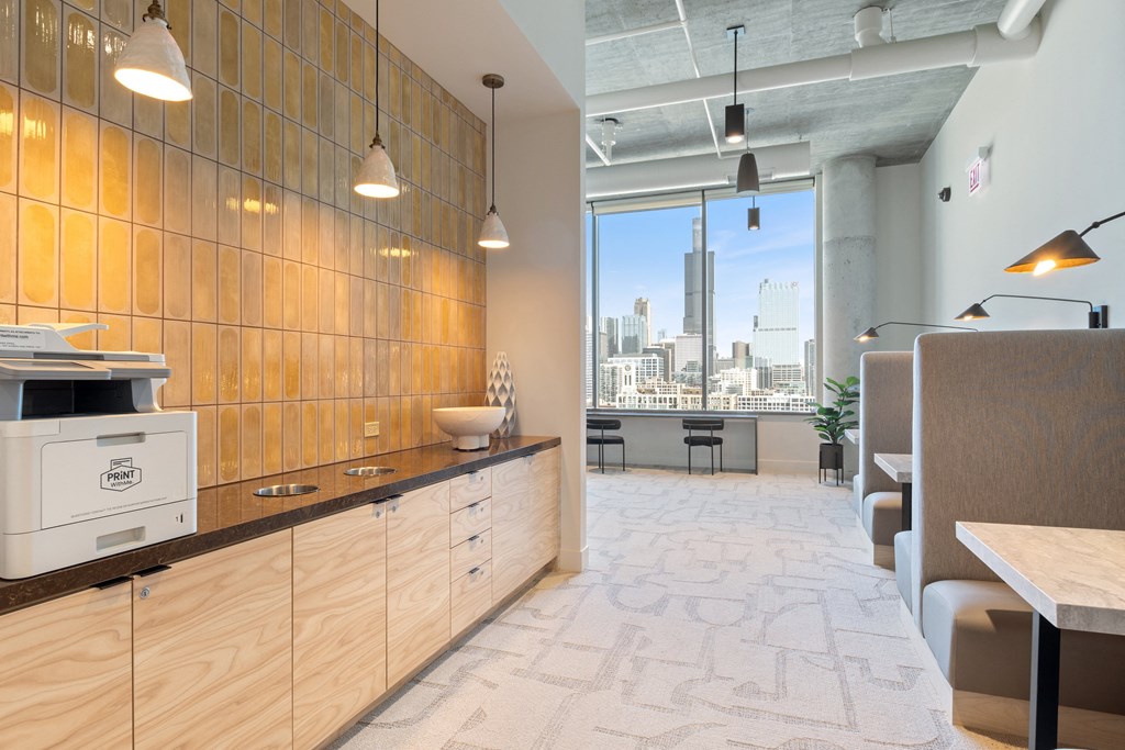 a kitchen with wooden cabinets and a large window