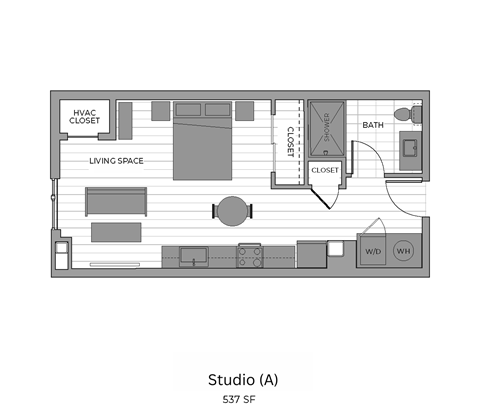 A floor plan of a studio apartment with a living space, bathroom, and kitchenette.