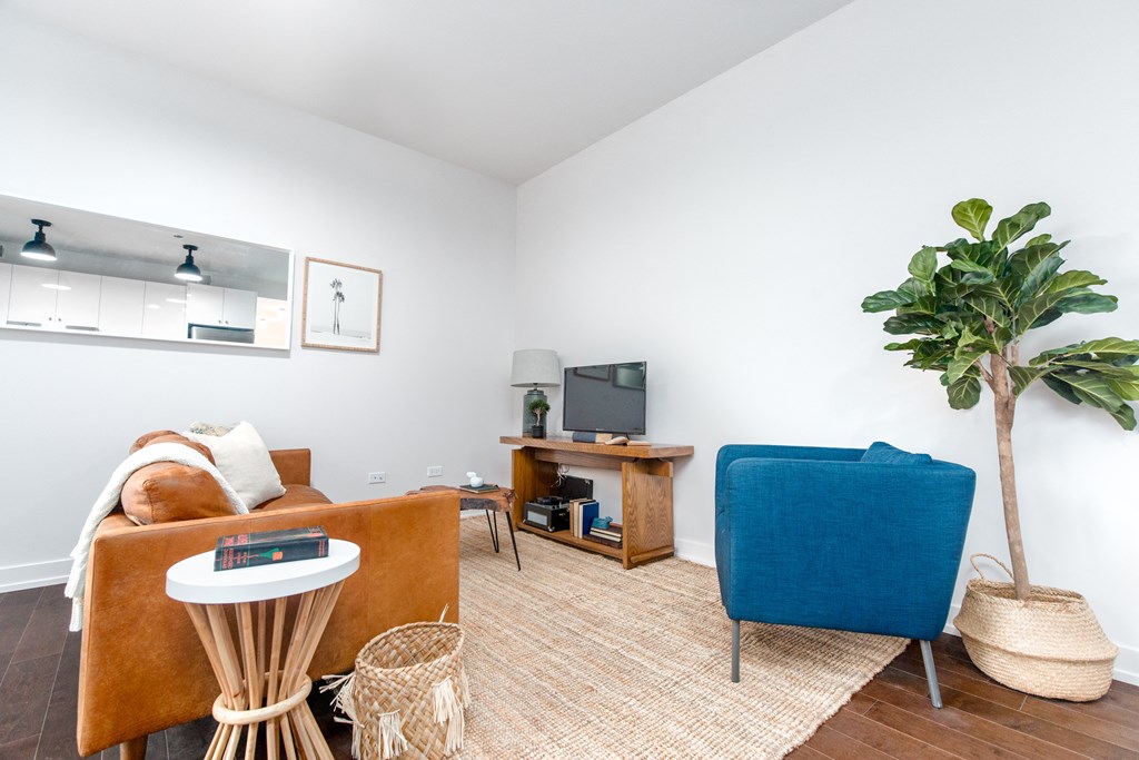 a living room with a couch and a chair