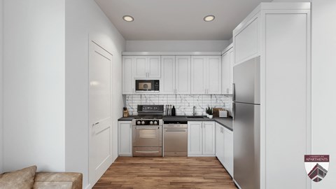 a white kitchen with stainless steel appliances and white cabinets