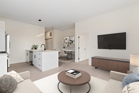 a living room with a couch and a table