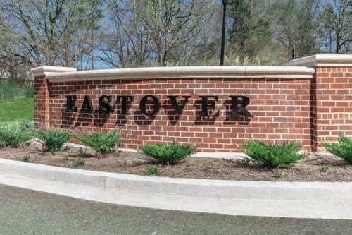 a brick sign on the side of a building