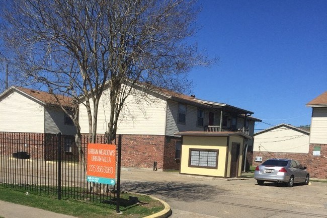 a house with a car parked in front of it