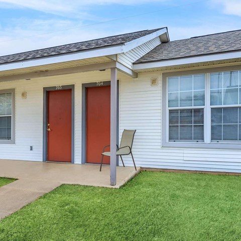 A house with the number 703 and 704 on the doors.