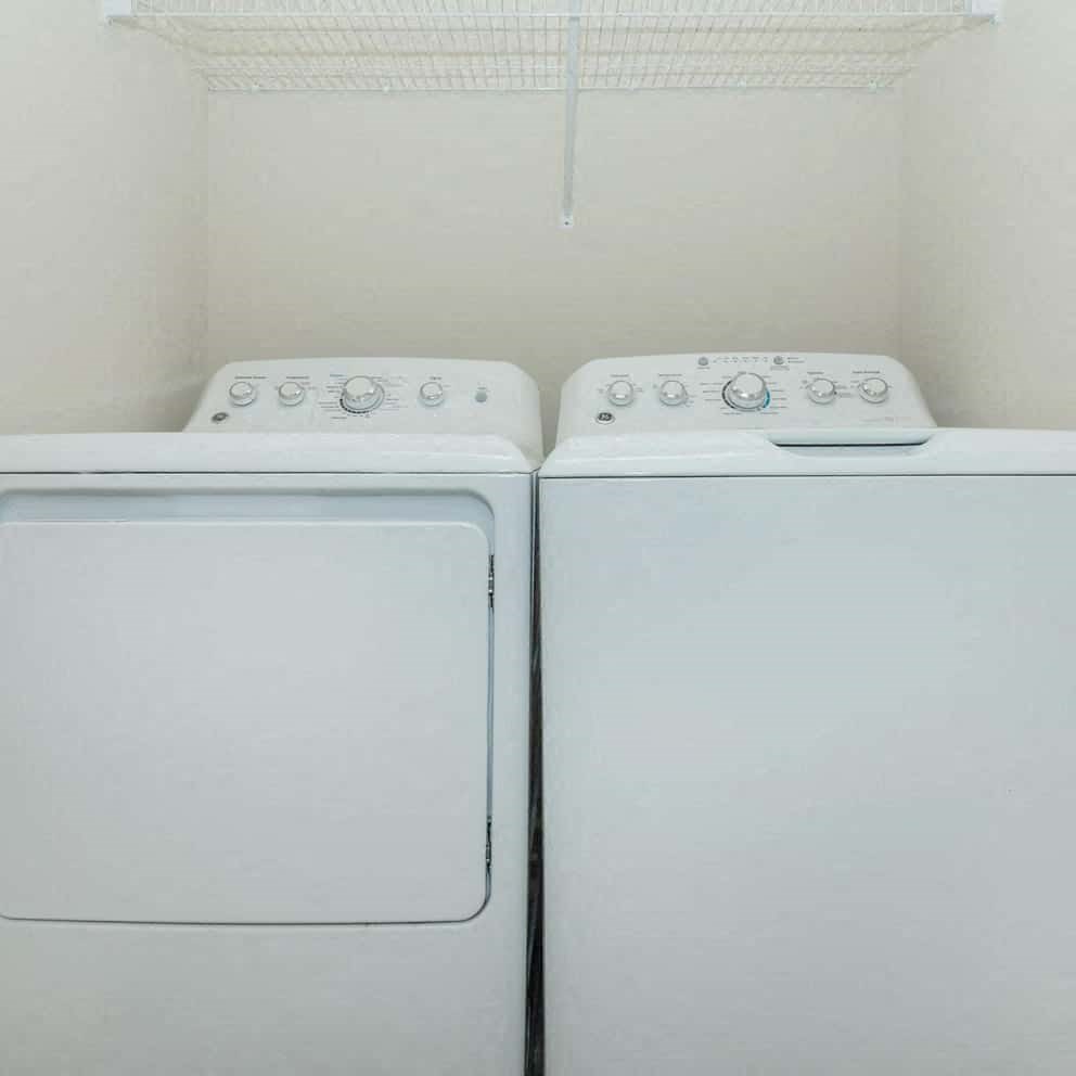 a washer and dryer in the laundry room of a home