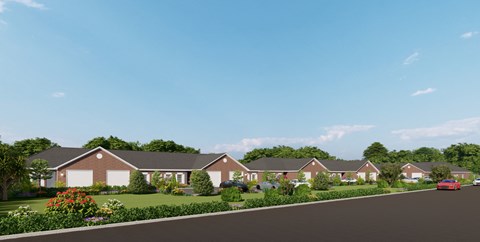 A row of houses with a red car parked in front of the first house.