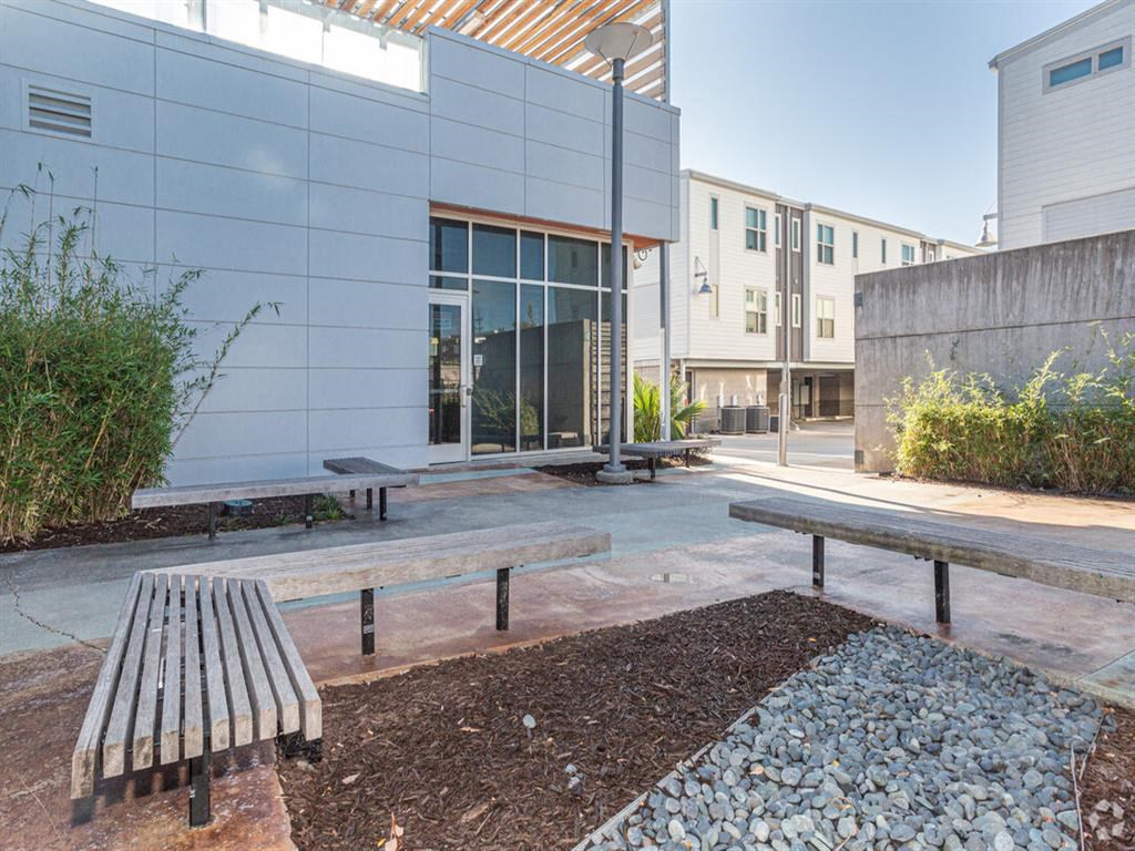 a group of benches in front of a building