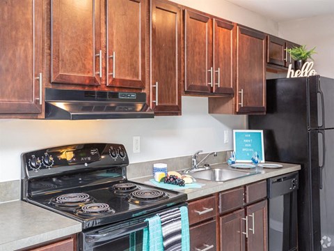 a kitchen with a stove and a sink