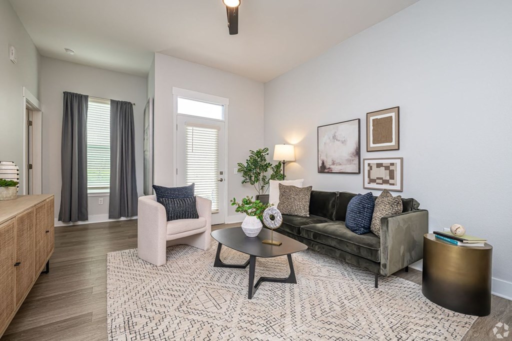 a living room with a couch and a table