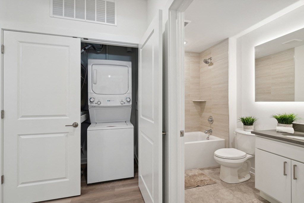 Bathroom with a washer and dryer at The Anchorage on Kelly, East Falls, Pennsylvania
