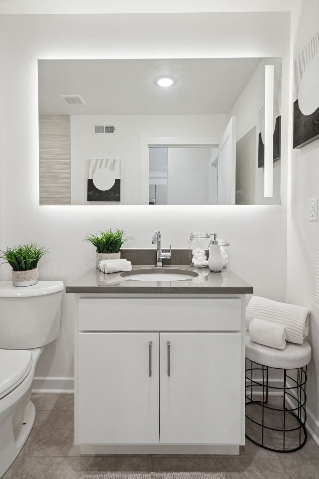 a bathroom with a sink and toilet in a 555 waverly unit  at The Anchorage on Kelly, East Falls, PA, 19129