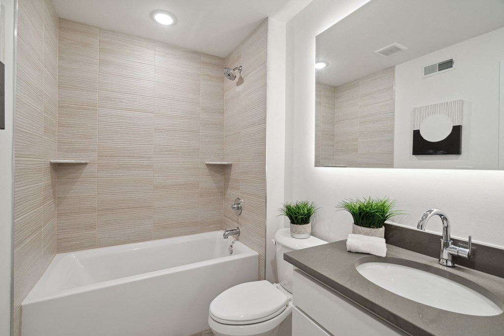 Bathroom with a sink toilet and bathtub  at The Anchorage on Kelly, East Falls, Pennsylvania