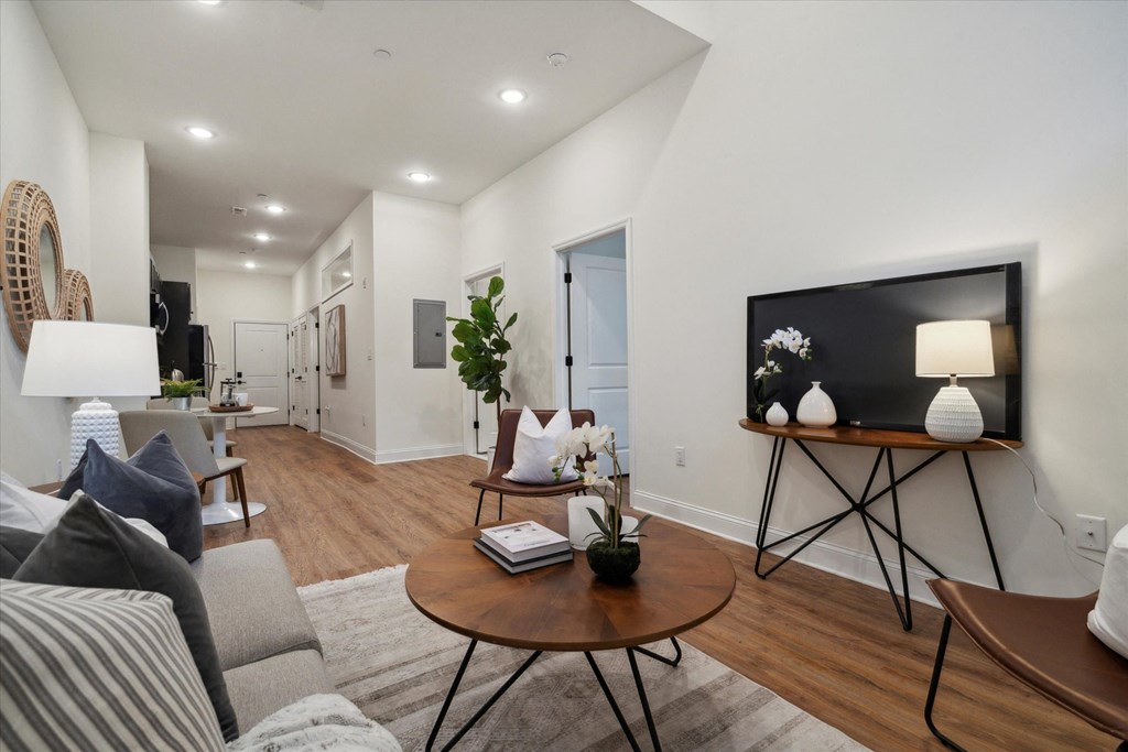 a living room with a couch and a table