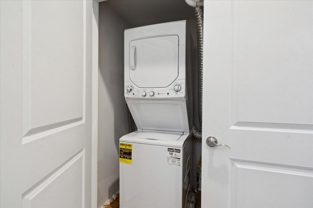 the laundry room has a washer and dryer in it