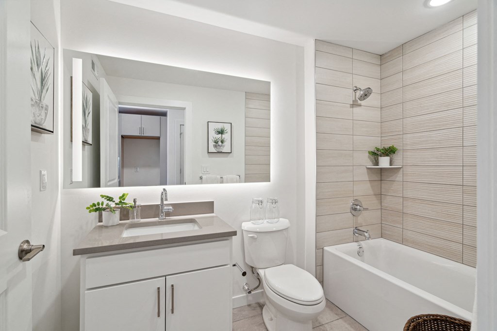 Bathroom with a sink toilet and a mirror  at The Anchorage on Kelly, Philadelphia