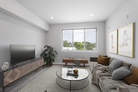 a living room with a couch and a television
