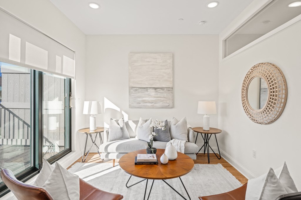 a living room with a couch and a table