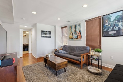 a living room with a couch and a coffee table