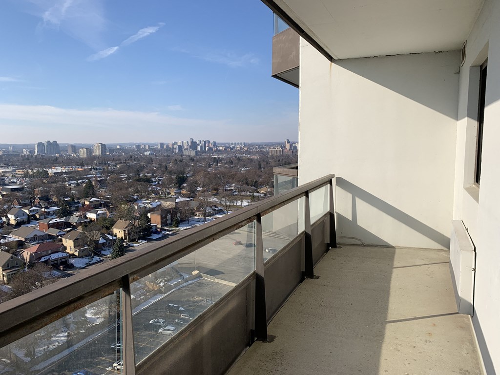 a view from a balcony on a skyscraper