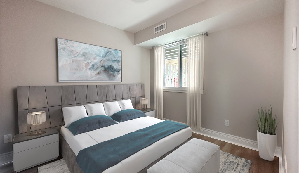 a bedroom with a bed and a large window