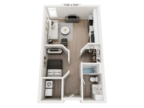 A top down view of a small apartment with a kitchen, living room, and bathroom.