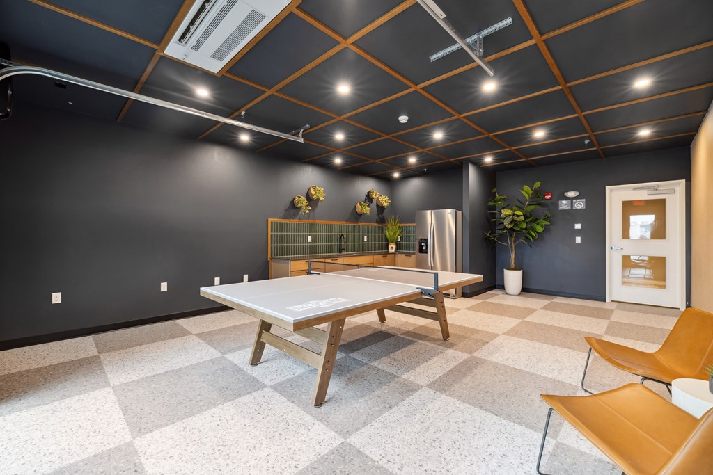 A room with a ping pong table