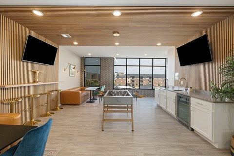 A modern kitchen with a view of the city.