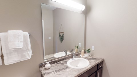 Bathroom With Vanity Lights at The Haven on Veterans, North Dakota, 58104