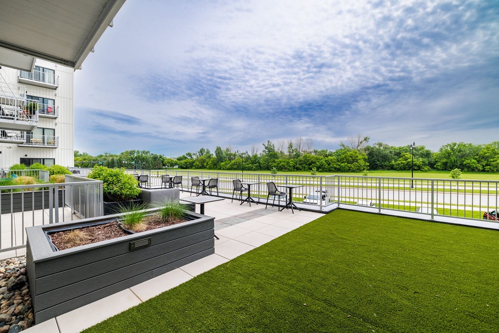 the preserve at ballantyne commons apartment balcony and grassat Northern Lights a Lifestyle-Driven Community, West Fargo, 58078
