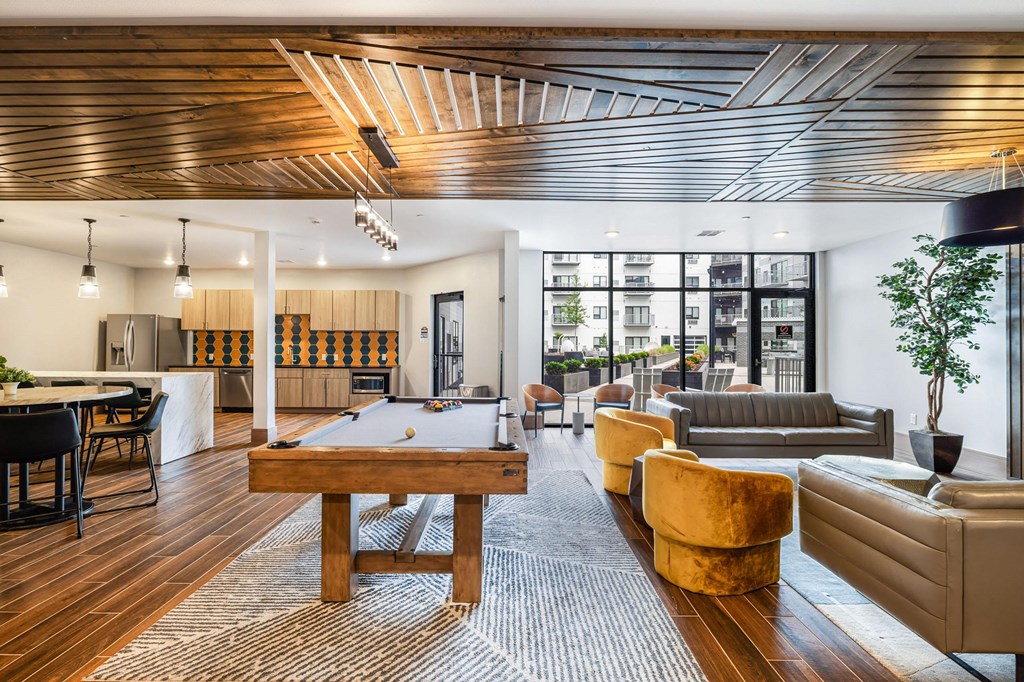 a living room filled with furniture and a tableat Northern Lights a Lifestyle-Driven Community, West Fargo, ND