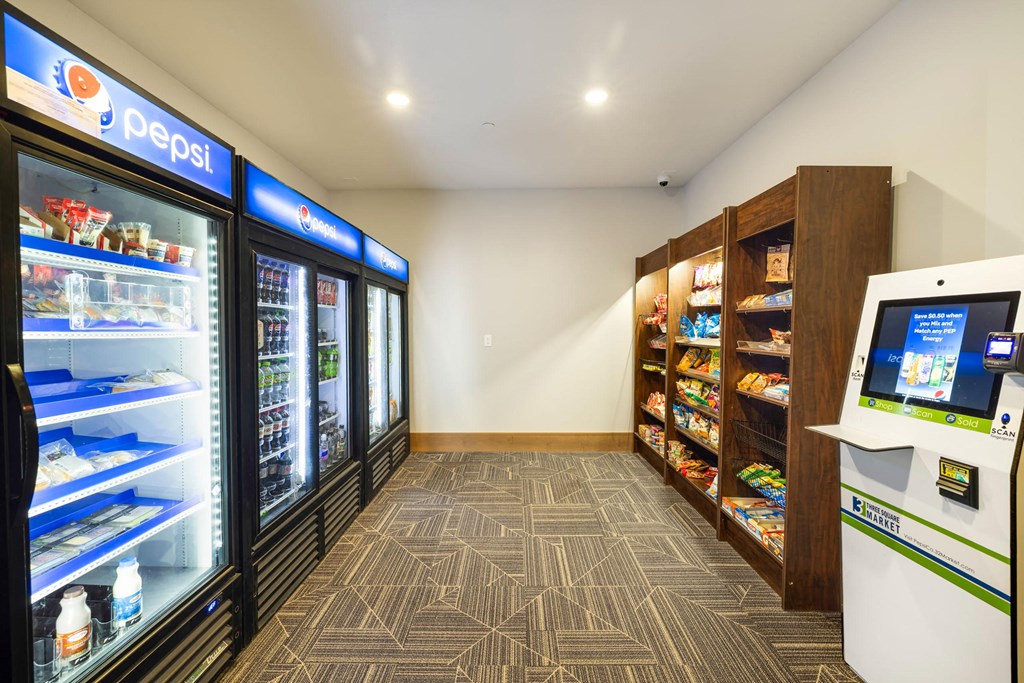 a convenience store with refrigerators and a vending machineat Northern Lights a Lifestyle-Driven Community, West Fargo, 58078