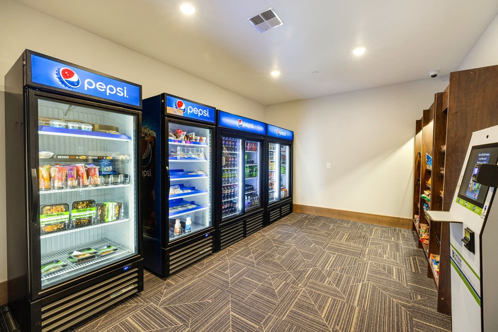 a convenience store with refrigerators and vending machinesat Northern Lights a Lifestyle-Driven Community, West Fargo, 58078