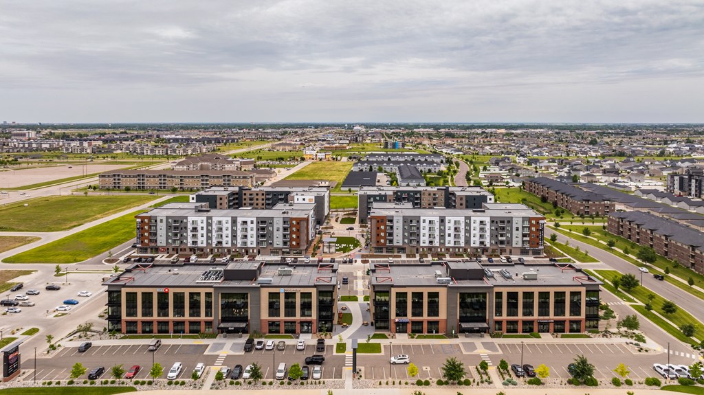 an aerial view of an urban area with buildings and cars at EagleRidge Plaza Residences, North Dakota, 58104
