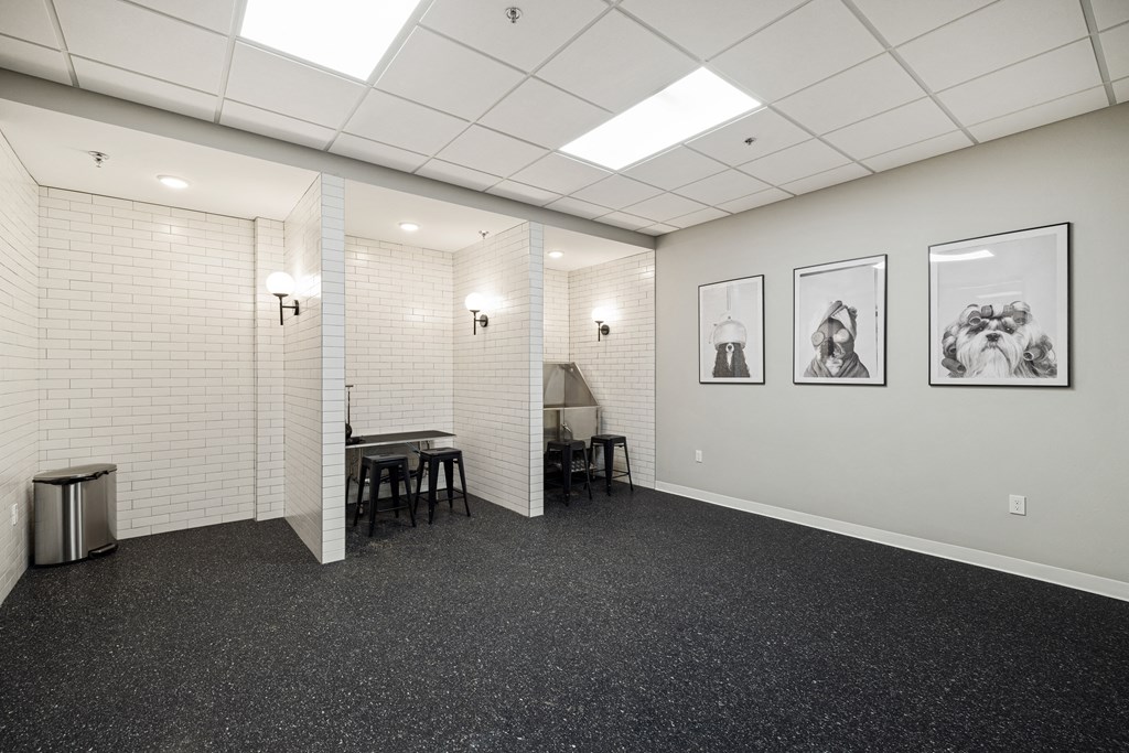 an empty room with white walls and a table and chairs at EagleRidge Plaza Residences, Fargo, ND, 58104