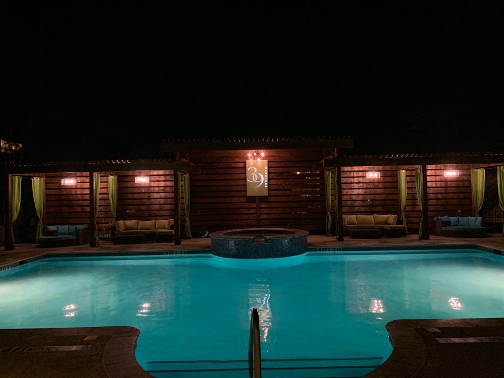 the swimming pool at night at the resort at night