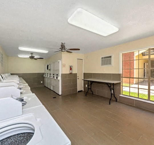 a kitchen with a stove and a table