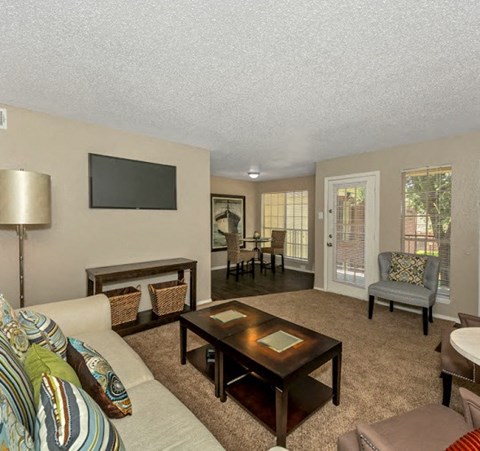 a living room with a couch and a table