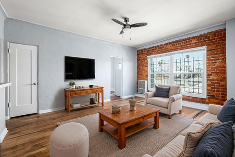 Living Room With TV at Normandie Summit Apartments, Los Angeles, CA
