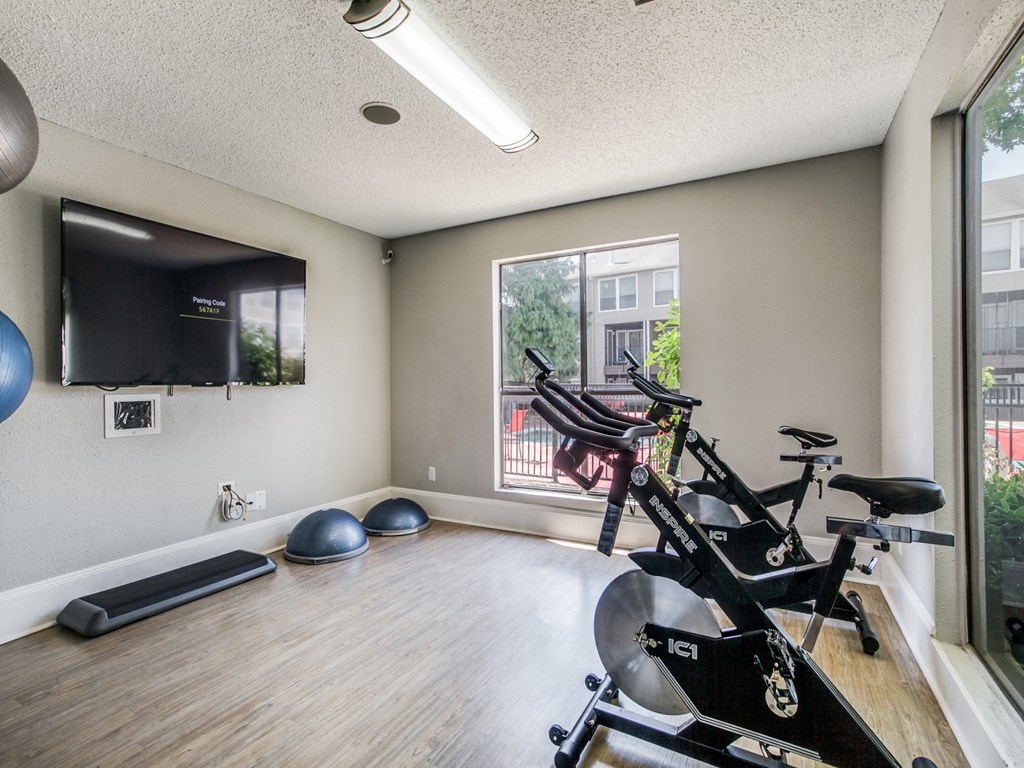 Gym with a exercise bike at Seacrest Apartments, Texas
