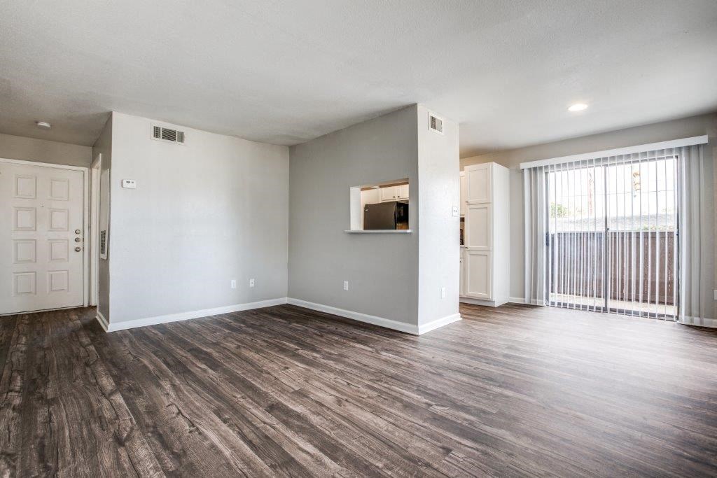 Living Room With Plenty Of Natural Light at Seacrest Apartments, Garland, 75044