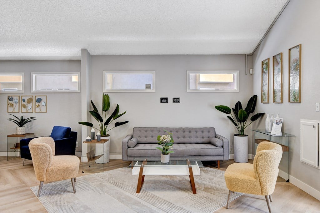 leasing office with 2 brown chair at Summer Meadows, Las Vegas