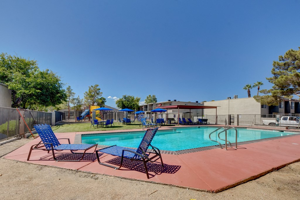 pool with 2 relaxing chair at Summerlin Meadows, Las Vegas