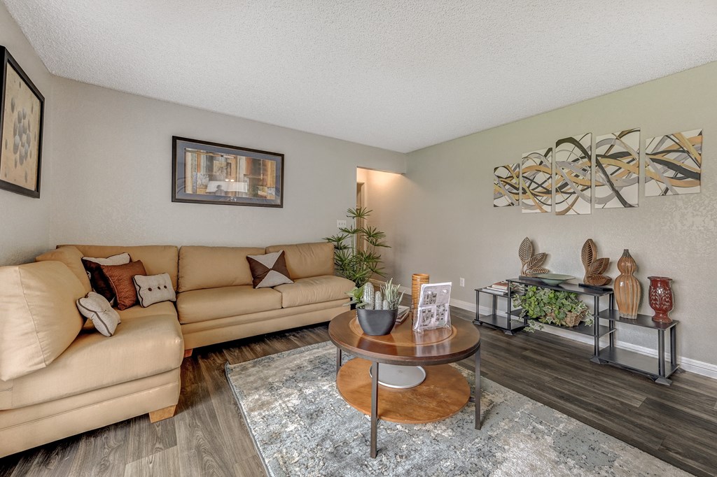 a living room with couches and a coffee table at Desert Bay Apartments, Laughlin, Nevada