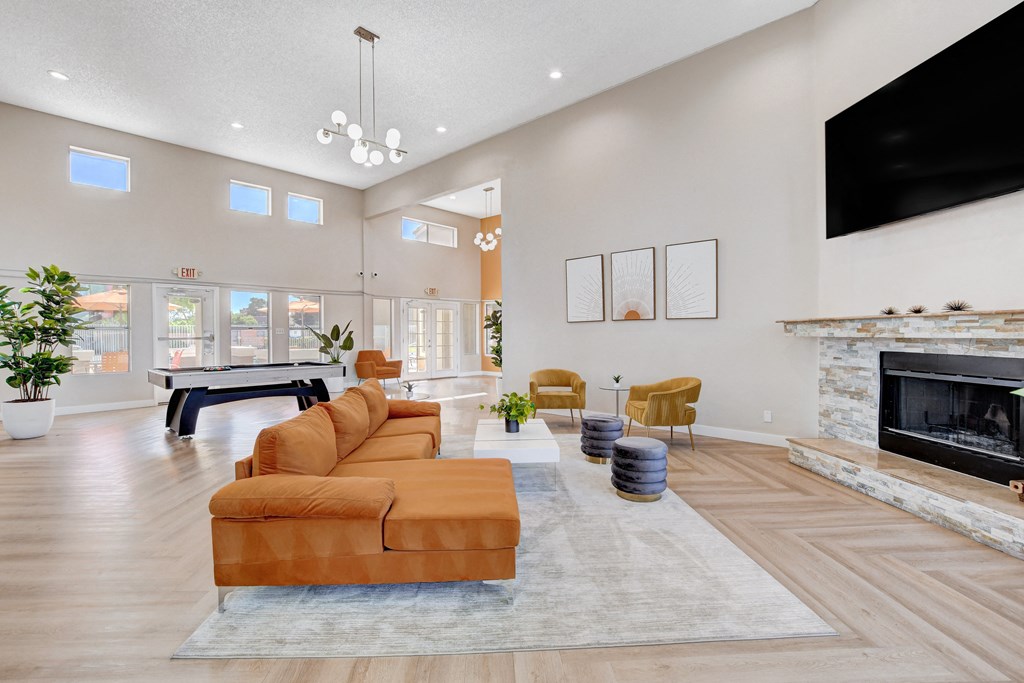 Living room with TV at Citrus Apartments, Las Vegas