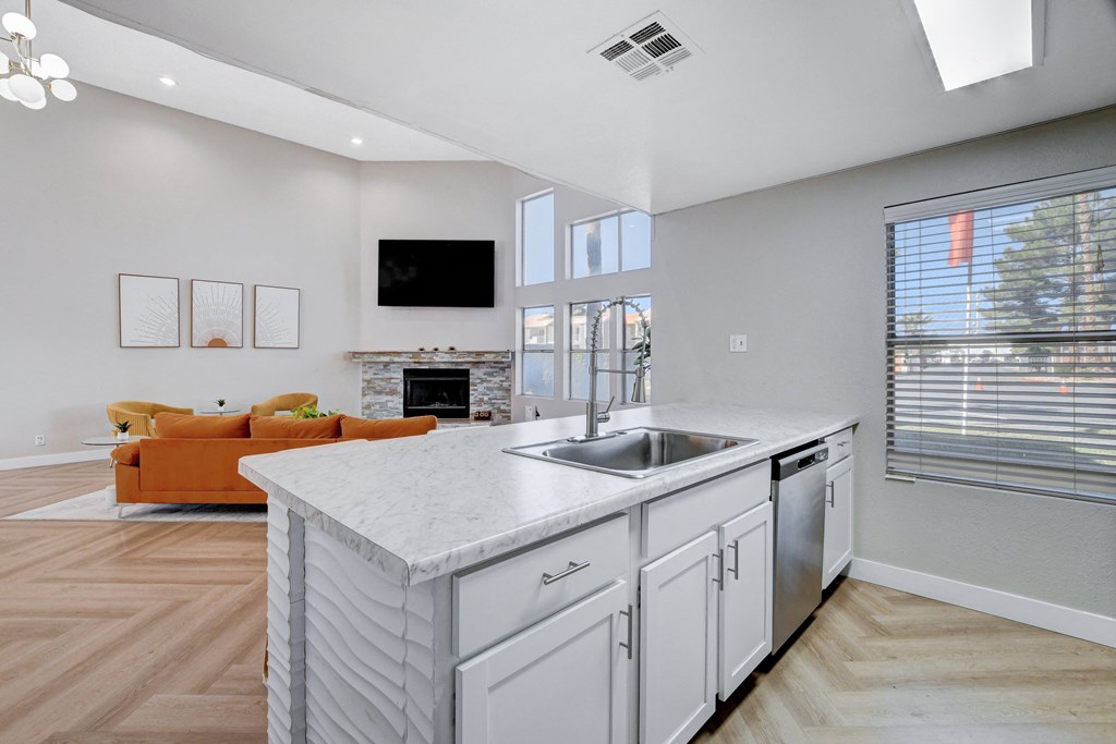 Kitchen with living room at Citrus Apartments, Las Vegas, NV