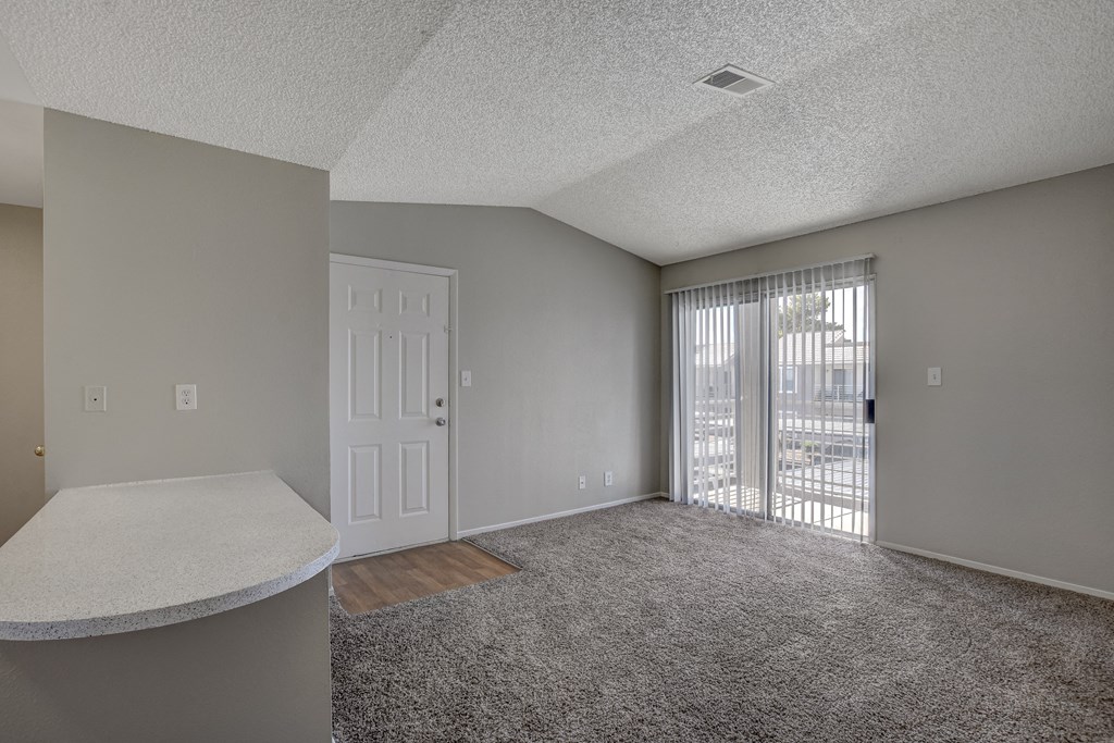 living room with large window at Citrus Apartments, Las Vegas,89101